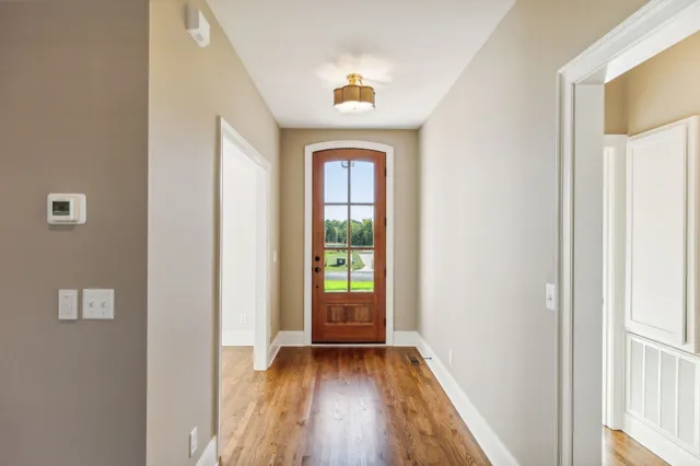 a room with a bed and a window