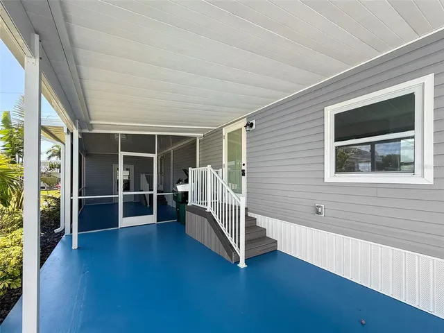 a view of a swimming pool with a chair