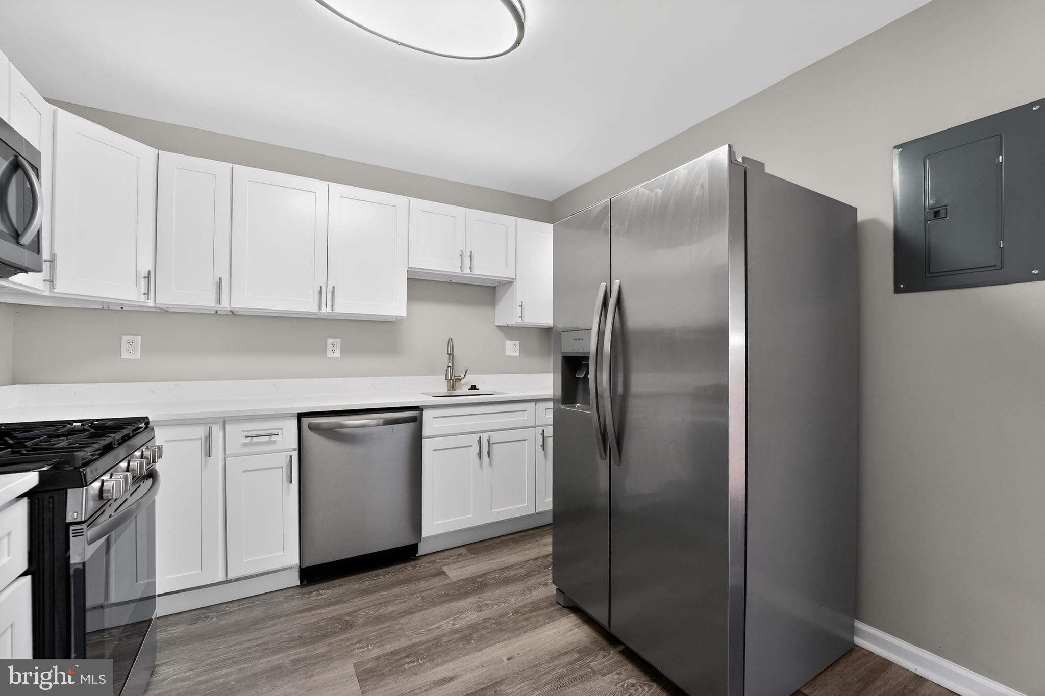8103 Cornwall Road Dundalk, MD 21222 - Photo 8 of 18 Modern kitchen with sleek appliances.