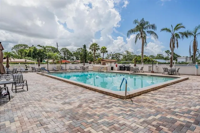swimming pool view with a outdoor space