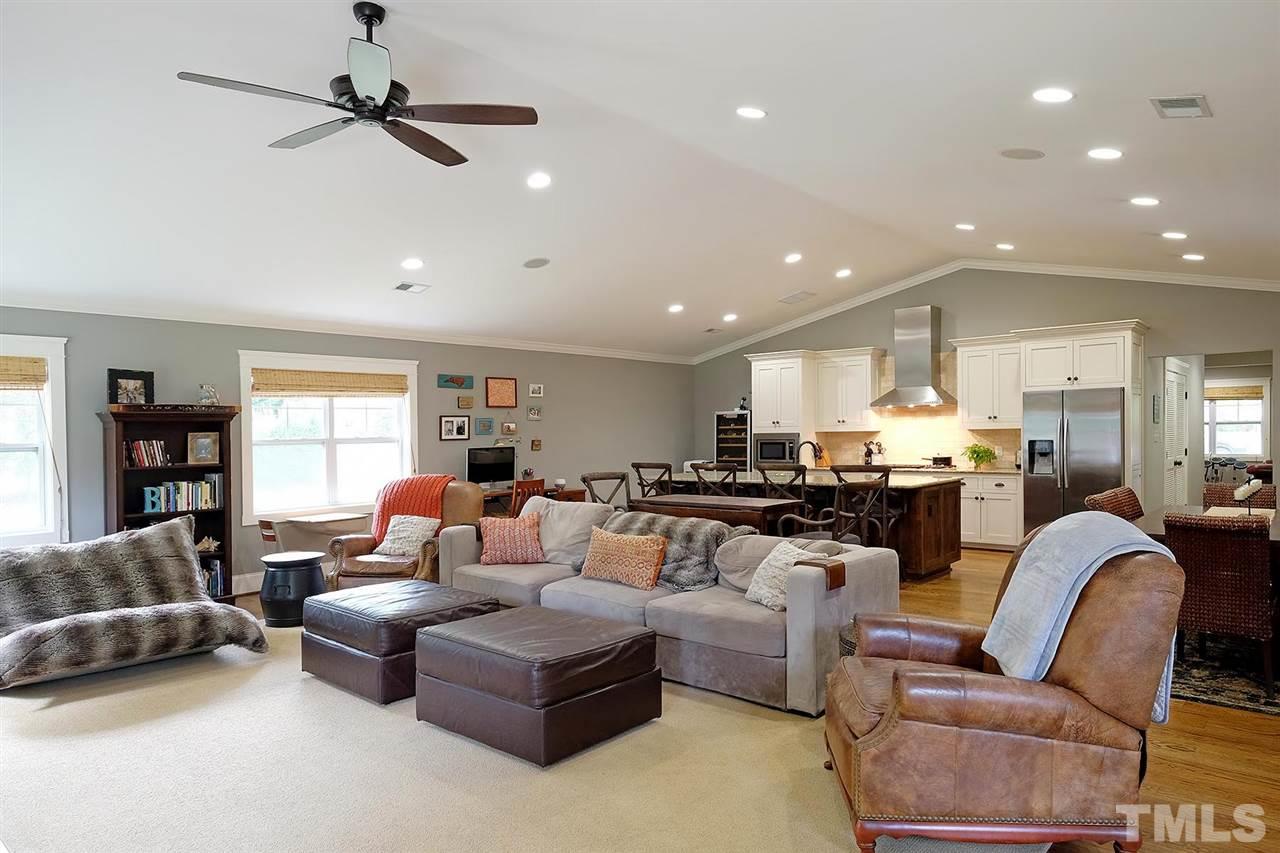 212 Lord Berkley Road Raleigh, NC 27610 - Photo 14 of 25 a living room with furniture kitchen view and a window