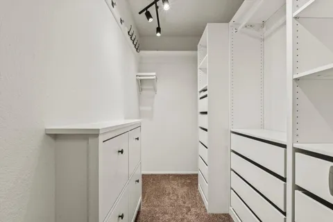 a wooden fence with flowers