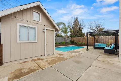 a front view of a house with swimming pool