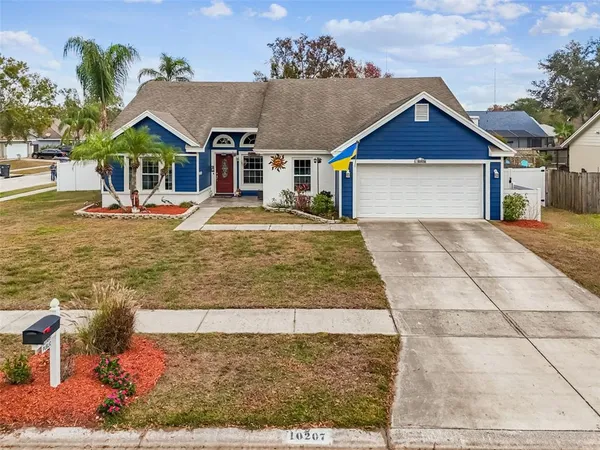 a house with yard in front of it