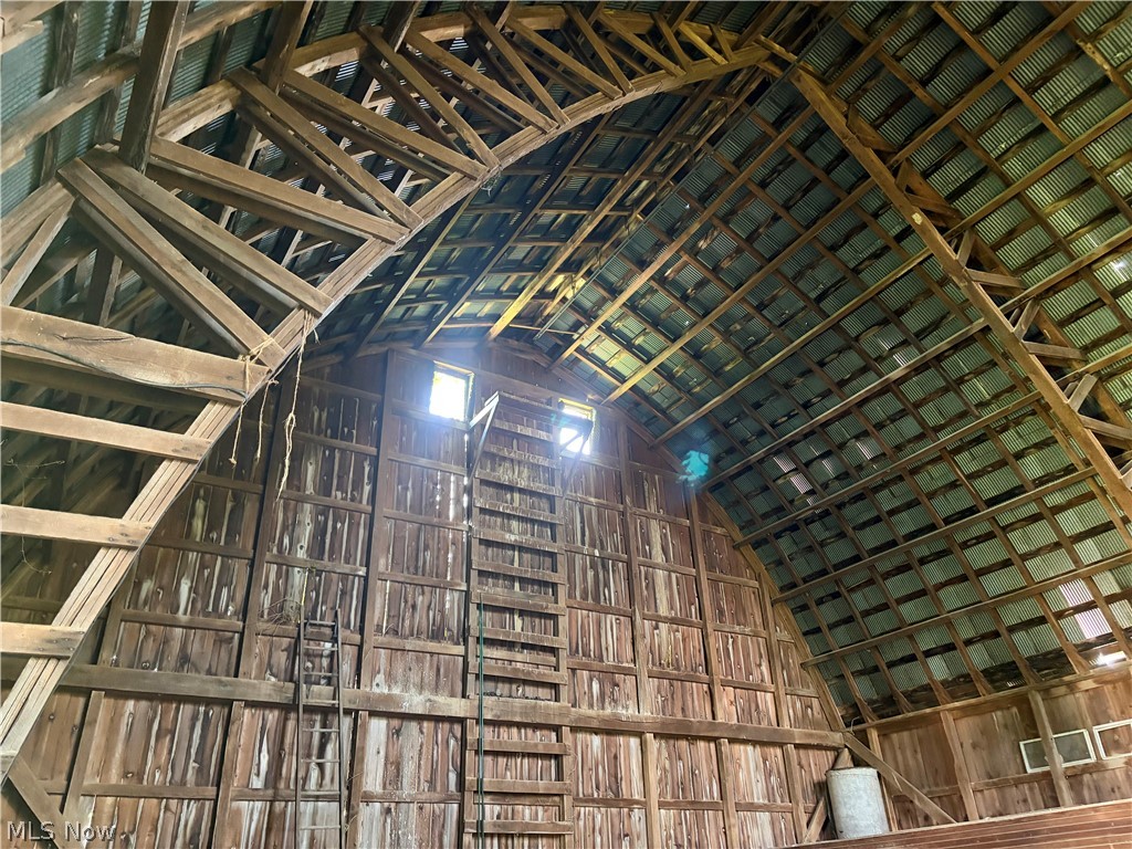 7251 Ryan Road Medina, OH 44256 - Photo 28 of 47 AMAZING barn with exposed wood framing and corrugated metal roofing and lower level