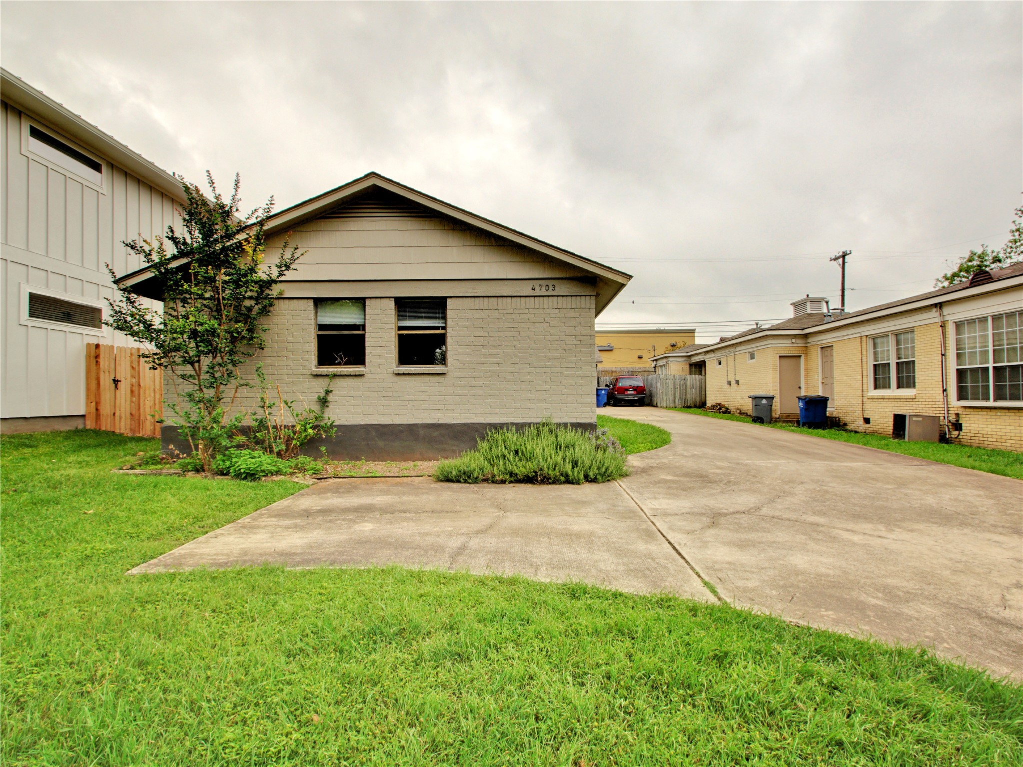 4703 Rosedale Avenue, Unit A Austin, TX 78756 - Photo 1 of 19 View of side of property featuring brick siding