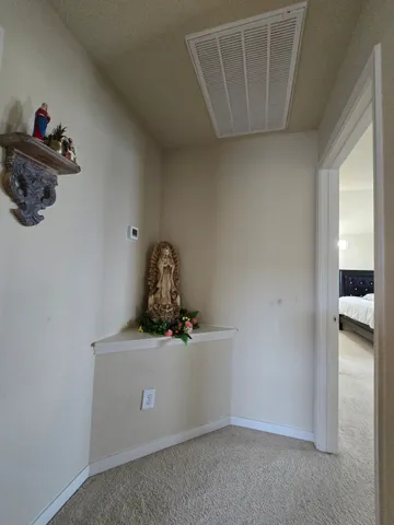 a view of small space with washing machine