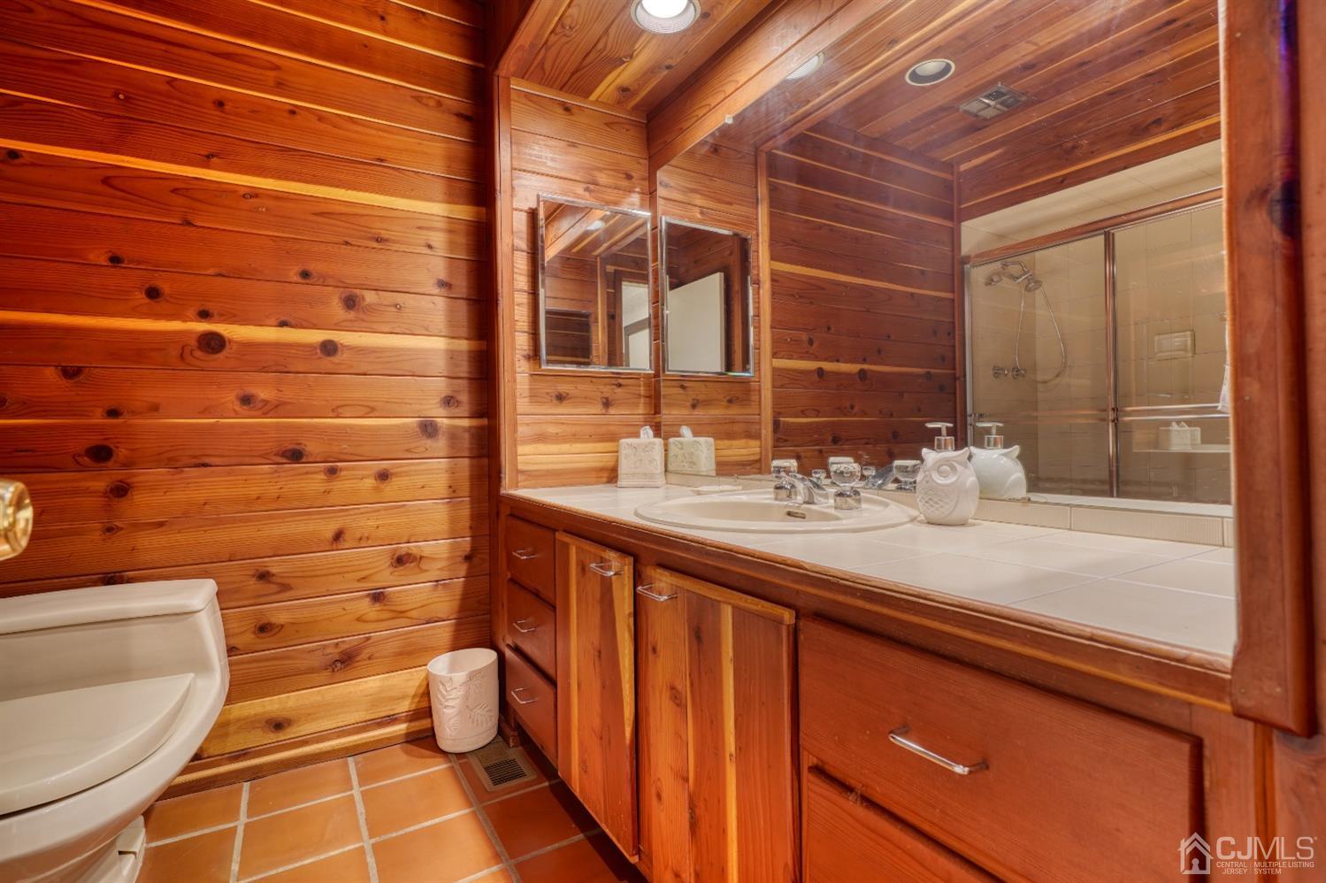 19 Morningside Drive Old Bridge, NJ 08857 - Photo 11 of 40 a bathroom with a sink and a mirror