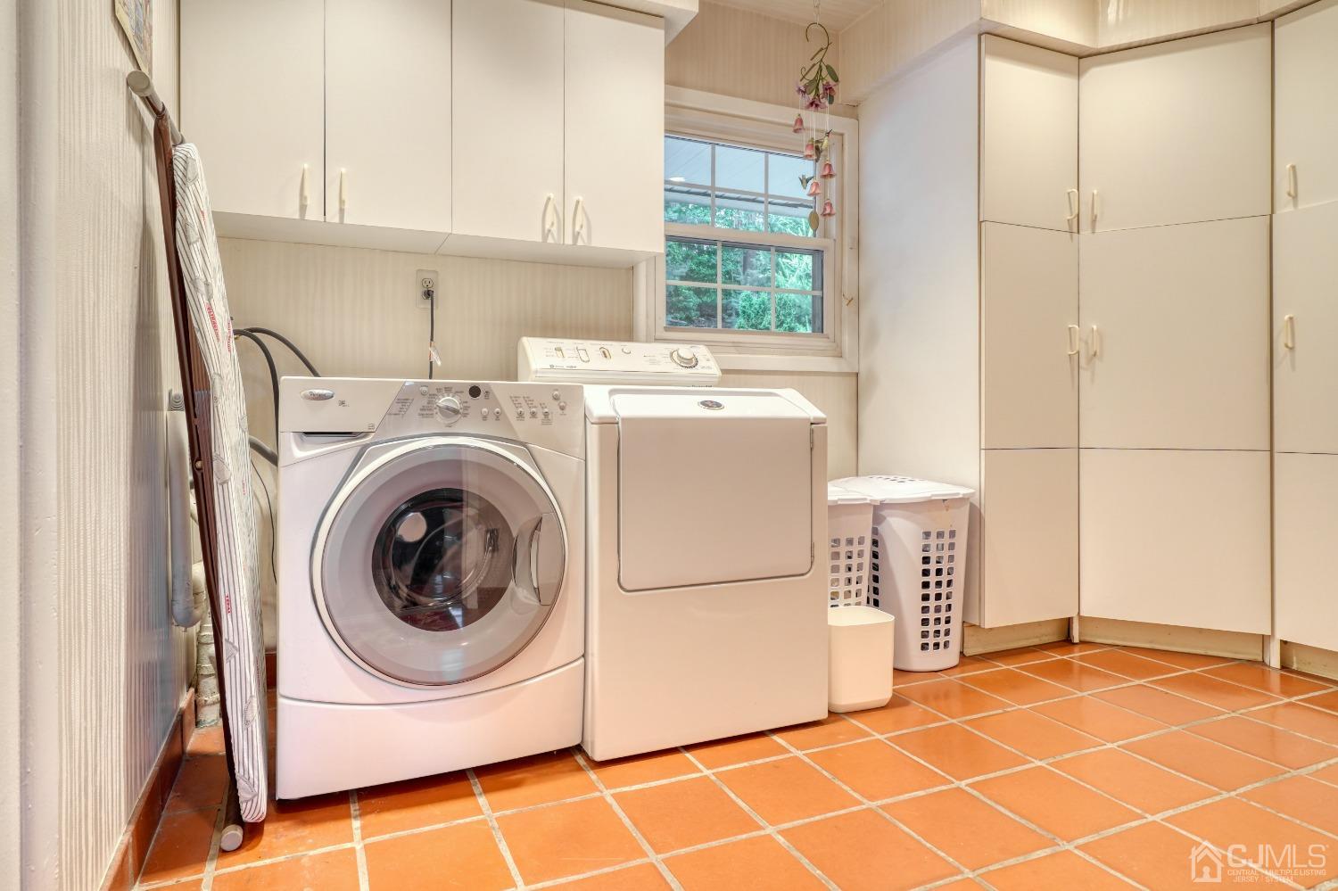 19 Morningside Drive Old Bridge, NJ 08857 - Photo 16 of 40 a utility room with dryer and washer