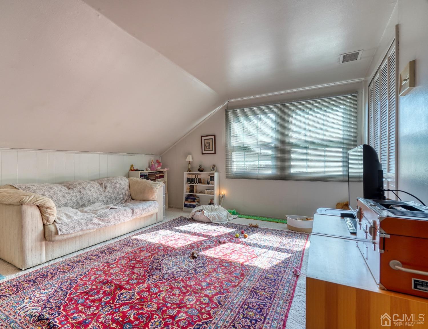 19 Morningside Drive Old Bridge, NJ 08857 - Photo 23 of 40 a bedroom with furniture and a window