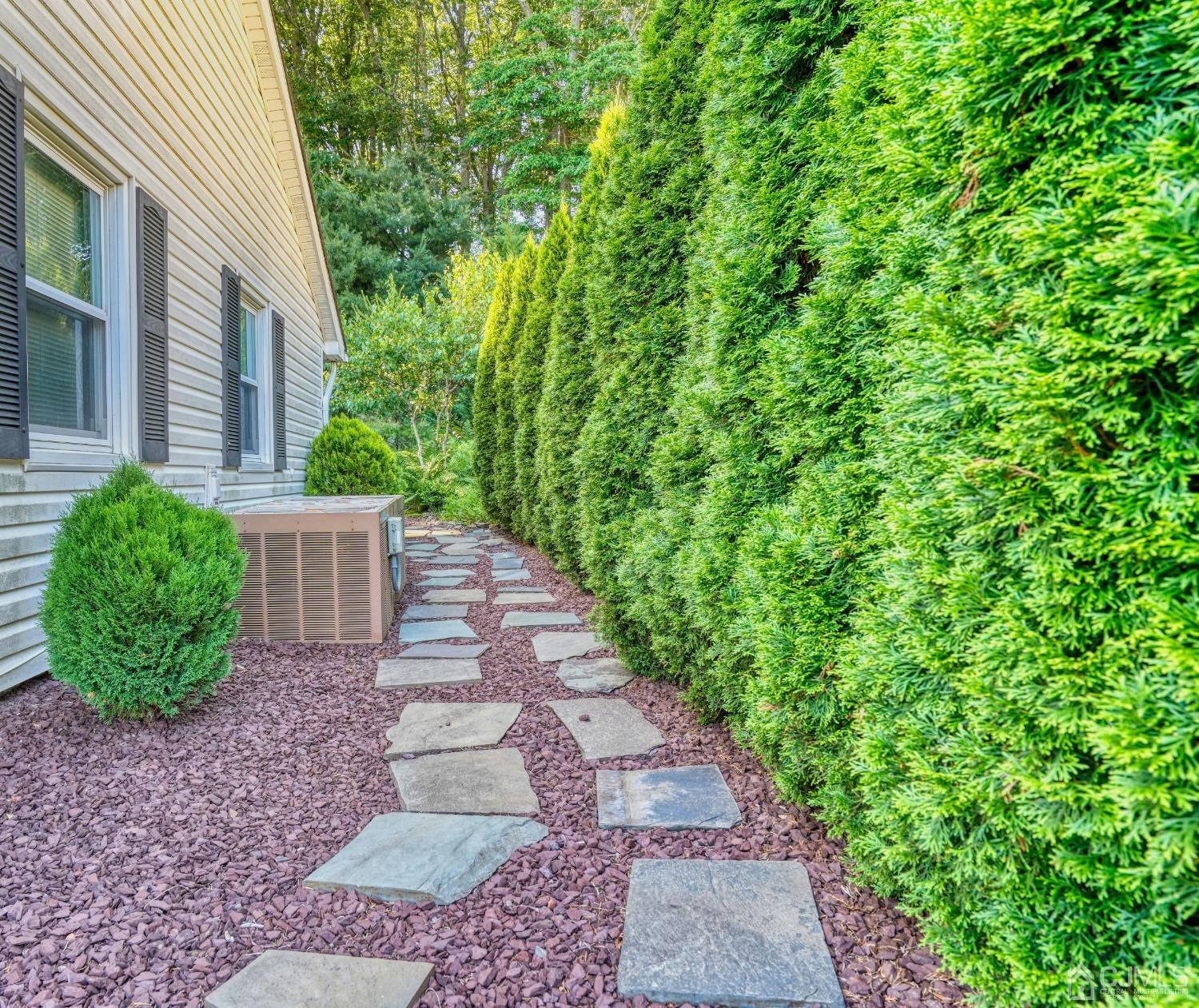 19 Morningside Drive Old Bridge, NJ 08857 - Photo 30 of 40 a view of a backyard with plants