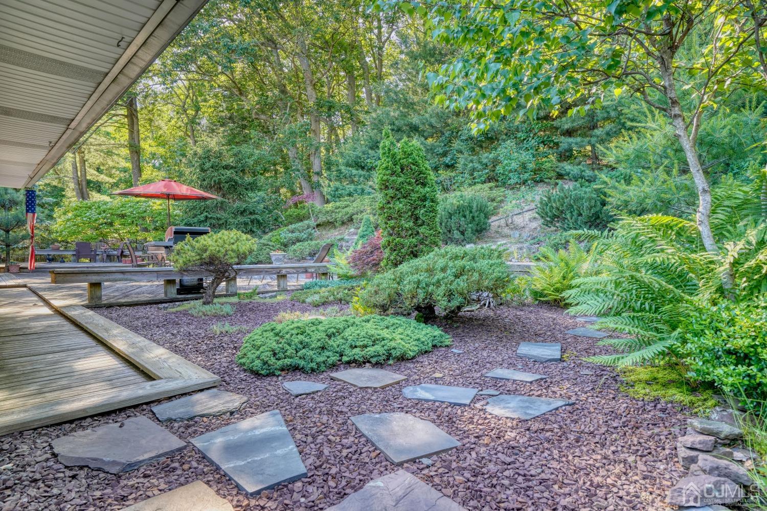 19 Morningside Drive Old Bridge, NJ 08857 - Photo 31 of 40 a view of a backyard with sitting area