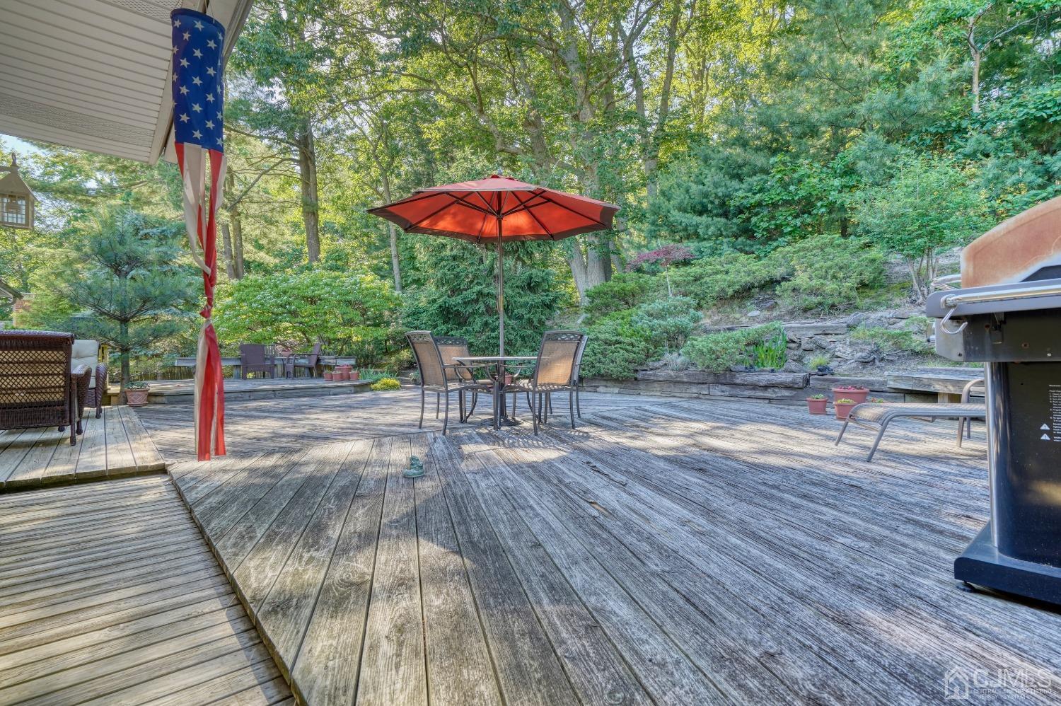 19 Morningside Drive Old Bridge, NJ 08857 - Photo 32 of 40 a backyard view with a seating space