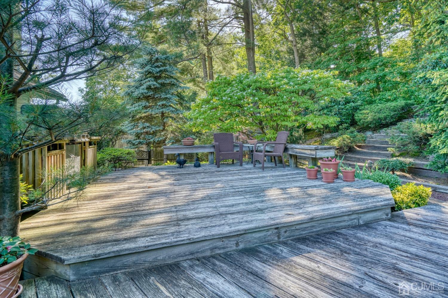 19 Morningside Drive Old Bridge, NJ 08857 - Photo 35 of 40 a wooden bench sitting on top of a wooden floor