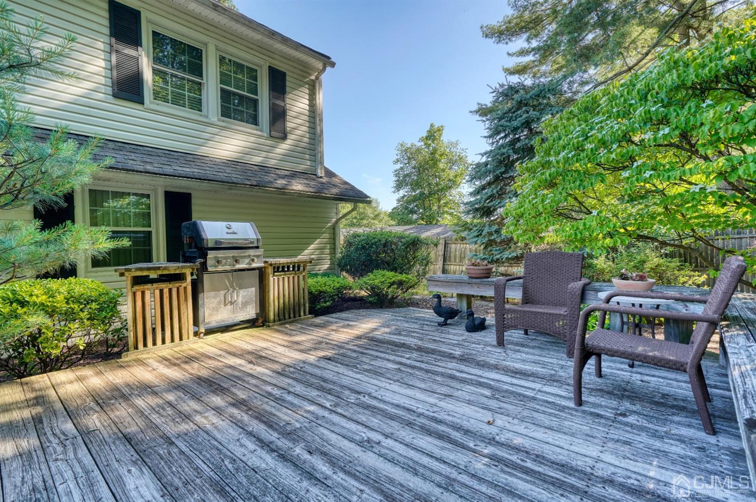 19 Morningside Drive Old Bridge, NJ 08857 - Photo 36 of 40 a view of a chairs and table on the wooden deck