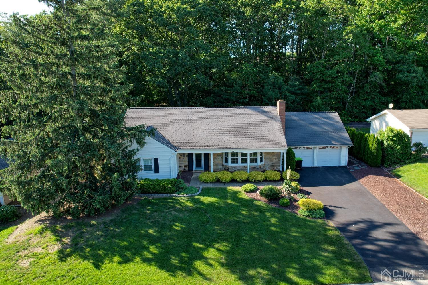 19 Morningside Drive Old Bridge, NJ 08857 - Photo 38 of 40 front view of a house with a yard