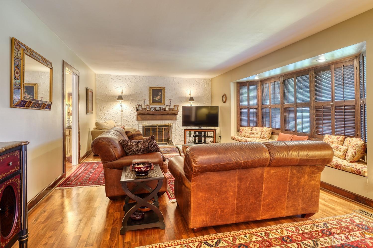 19 Morningside Drive Old Bridge, NJ 08857 - Photo 5 of 40 a bed room with furniture and a flat screen tv