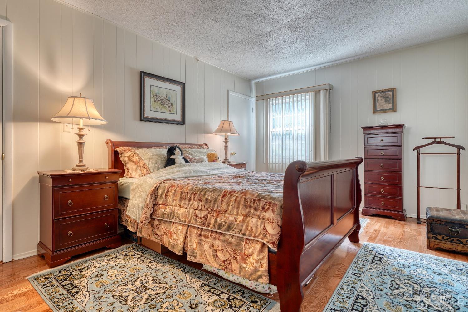 19 Morningside Drive Old Bridge, NJ 08857 - Photo 9 of 40 a bedroom with bed and wooden floor
