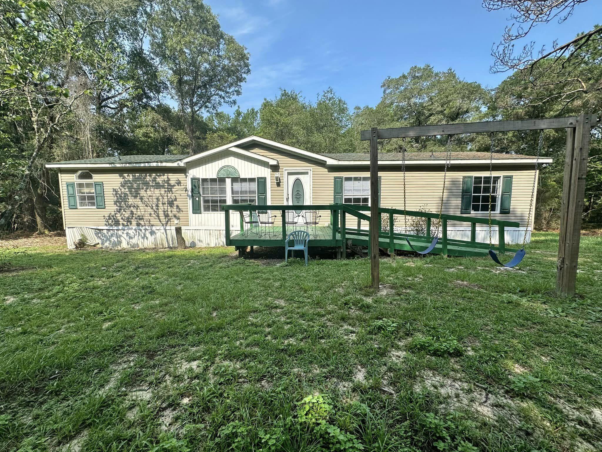 456 Corbin Gainey Road DeFuniak Springs, FL 32435 - Photo 1 of 15 359830540_10227119289065264_783079290235