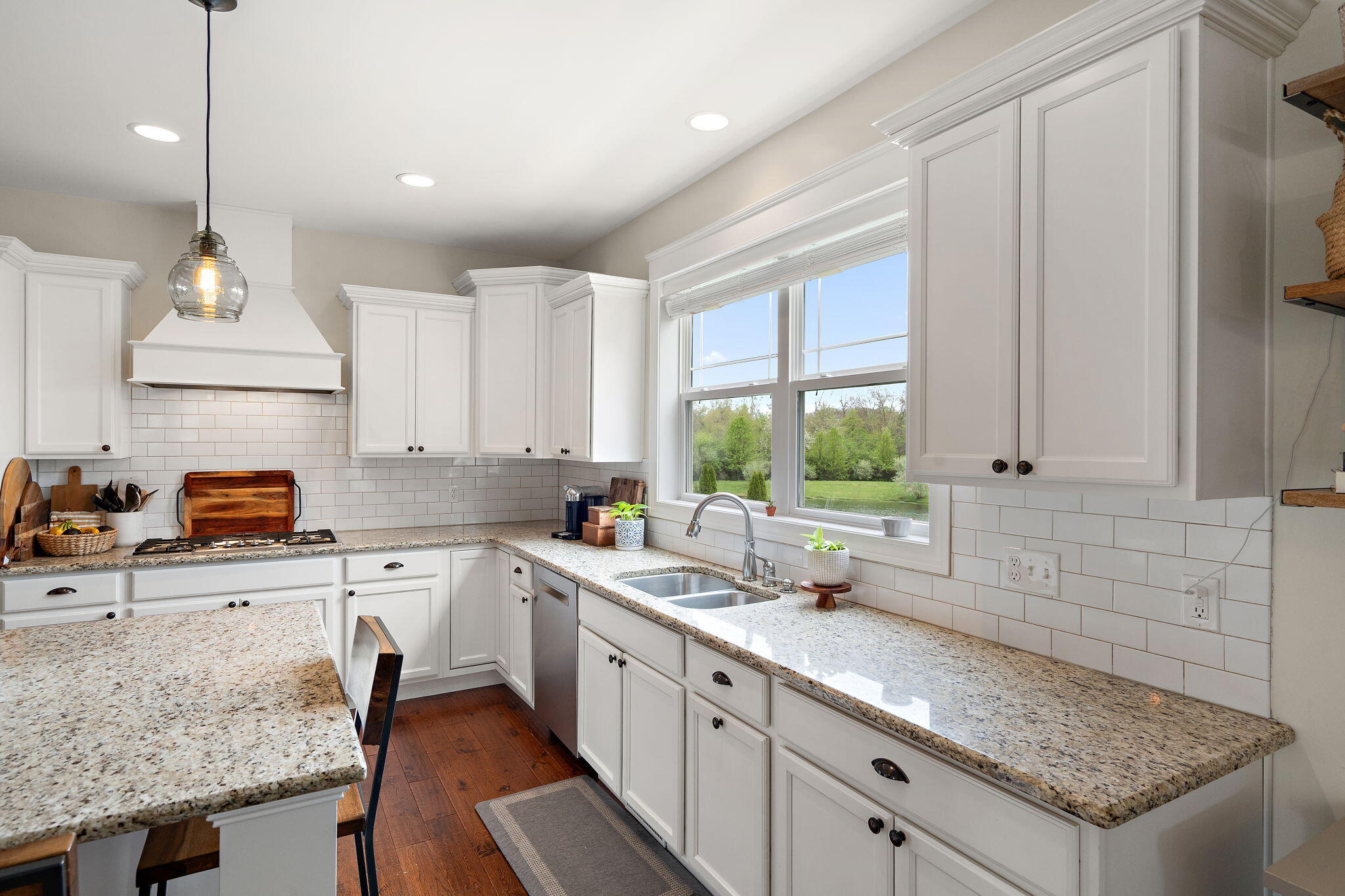 1684 Kleven Lane Crown Point, IN 46307 - Photo 13 of 55 a kitchen with a sink stove and cabinets
