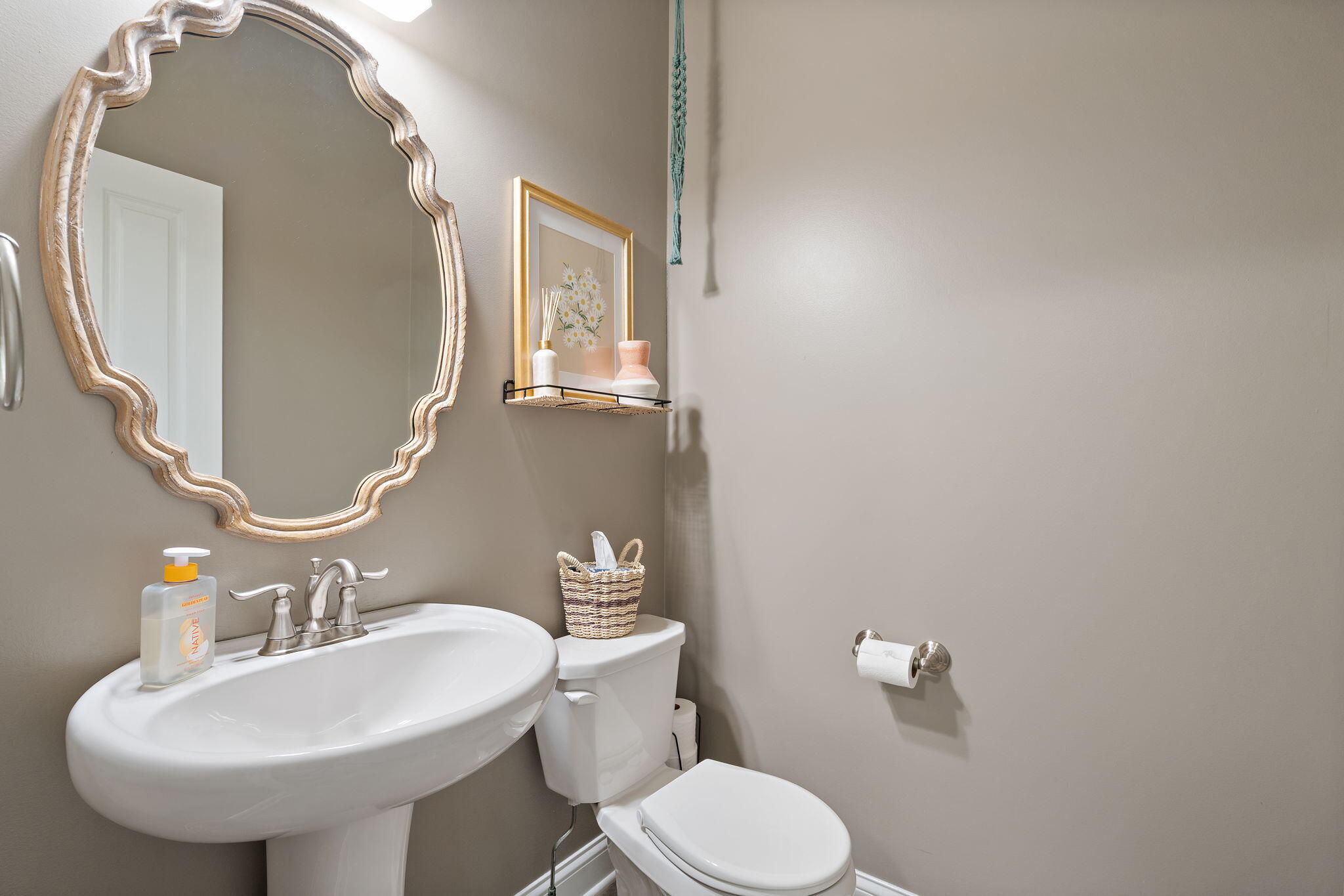 1684 Kleven Lane Crown Point, IN 46307 - Photo 18 of 55 a bathroom with a sink a toilet and mirror
