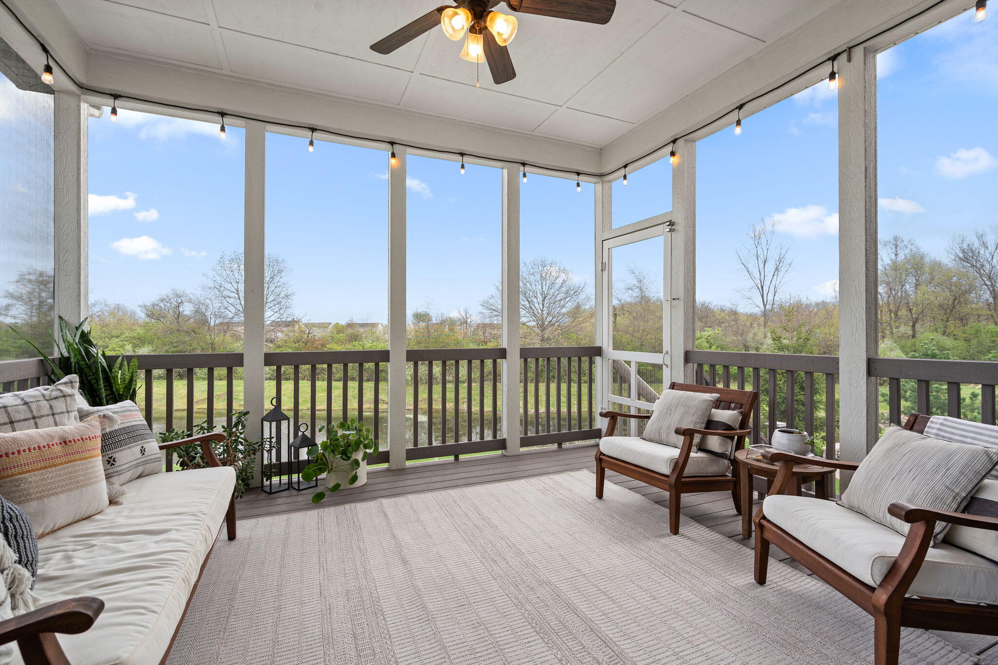 1684 Kleven Lane Crown Point, IN 46307 - Photo 19 of 55 a living room with furniture and floor to ceiling windows