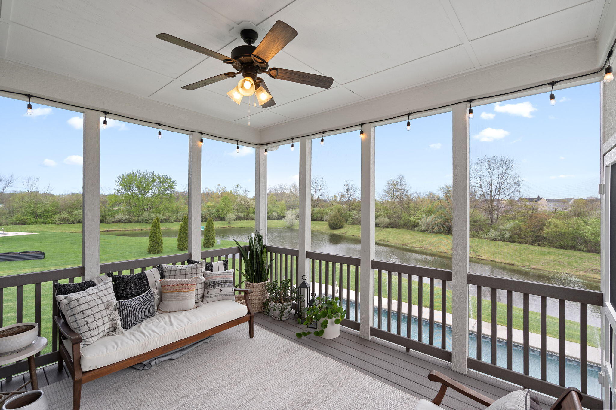 1684 Kleven Lane Crown Point, IN 46307 - Photo 20 of 55 a living room with furniture and a floor to ceiling window