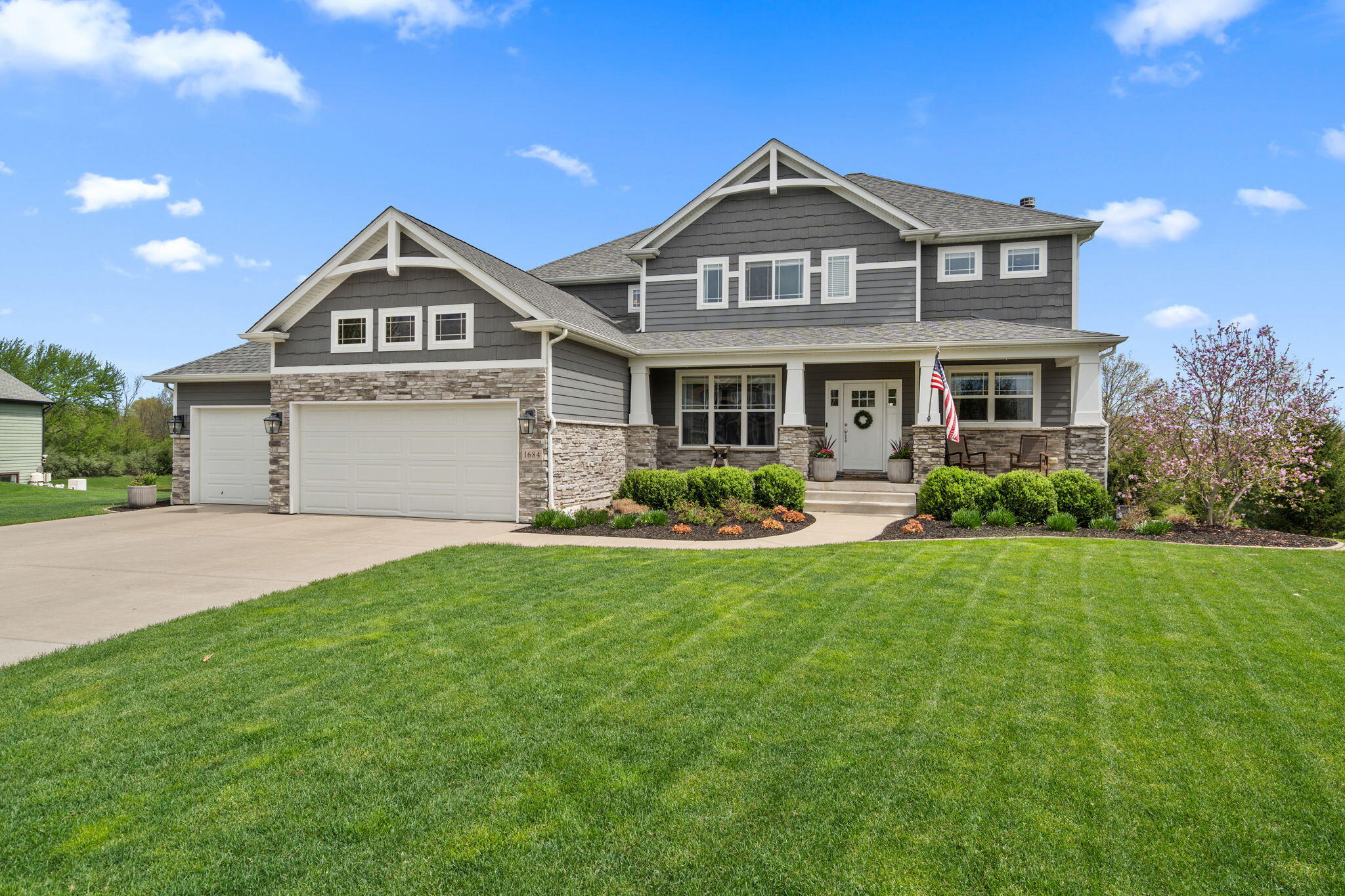 1684 Kleven Lane Crown Point, IN 46307 - Photo 2 of 55 a front view of a house with garden