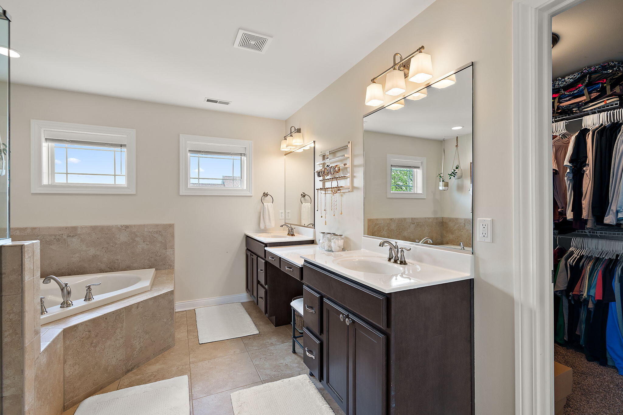1684 Kleven Lane Crown Point, IN 46307 - Photo 26 of 55 a bathroom with a sink a toilet and a mirror
