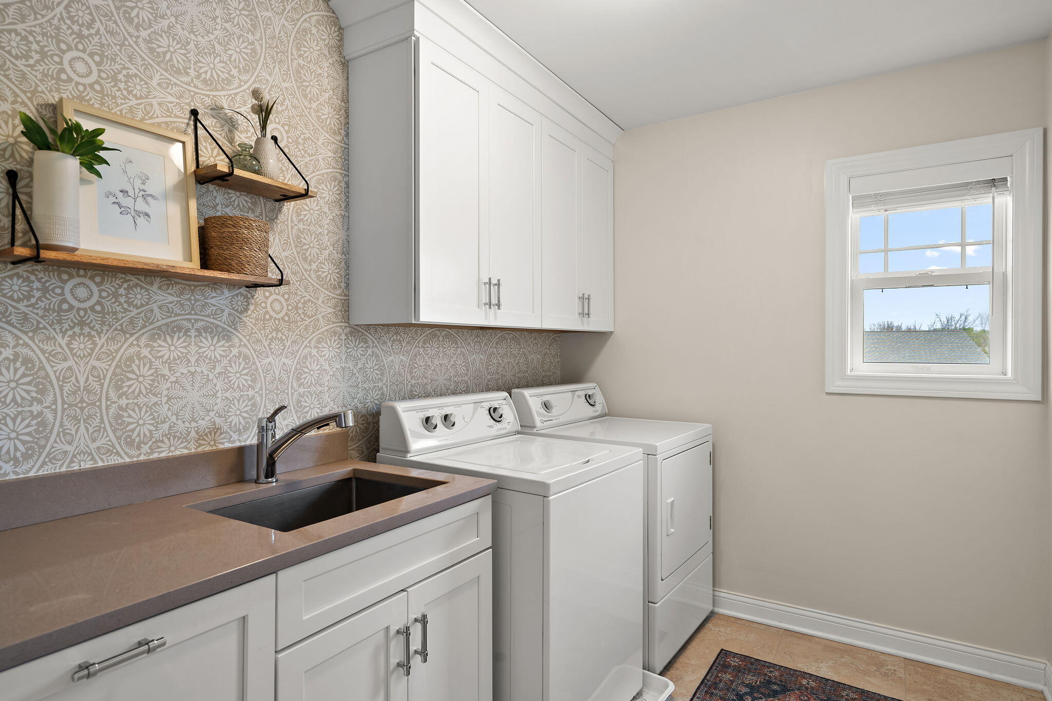 1684 Kleven Lane Crown Point, IN 46307 - Photo 34 of 55 a view of a kitchen with sink and washer