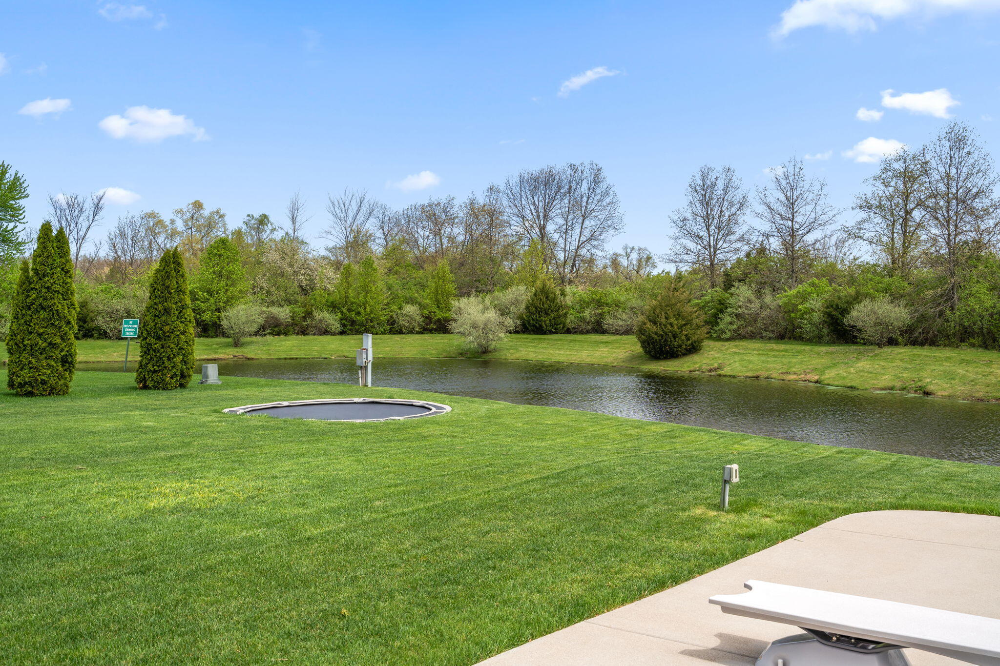 1684 Kleven Lane Crown Point, IN 46307 - Photo 51 of 55 a view of a lake with a yard