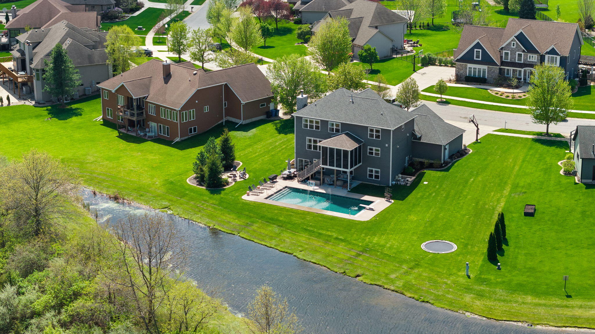 1684 Kleven Lane Crown Point, IN 46307 - Photo 52 of 55 an aerial view of a house with garden space and street view