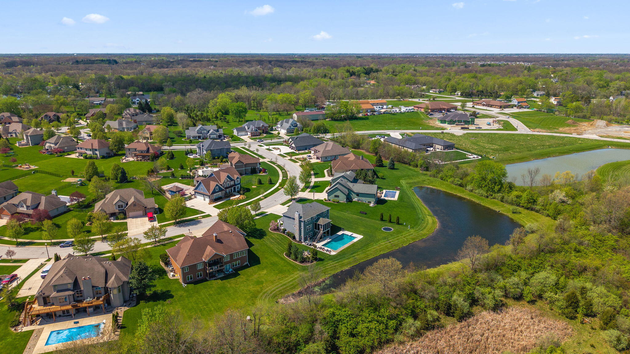 1684 Kleven Lane Crown Point, IN 46307 - Photo 54 of 55 an aerial view of residential houses with outdoor space and river
