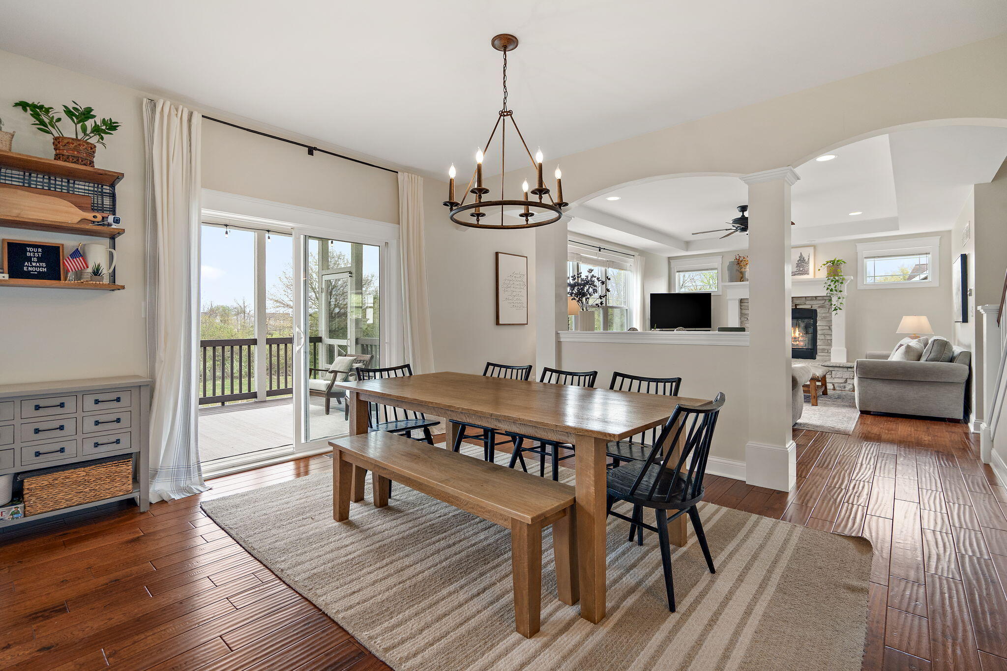 1684 Kleven Lane Crown Point, IN 46307 - Photo 9 of 55 a view of a dining room with furniture window and wooden floor