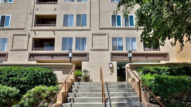 front view of a building with a window and a fireplace