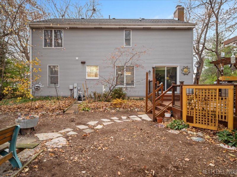 2040 Forest Ridge Road St. Charles, IL 60174 - Photo 32 of 33 a front view of a house with garden