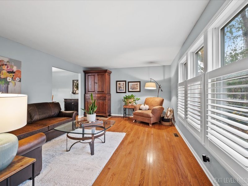 2040 Forest Ridge Road St. Charles, IL 60174 - Photo 6 of 33 a living room with furniture fireplace and a large window