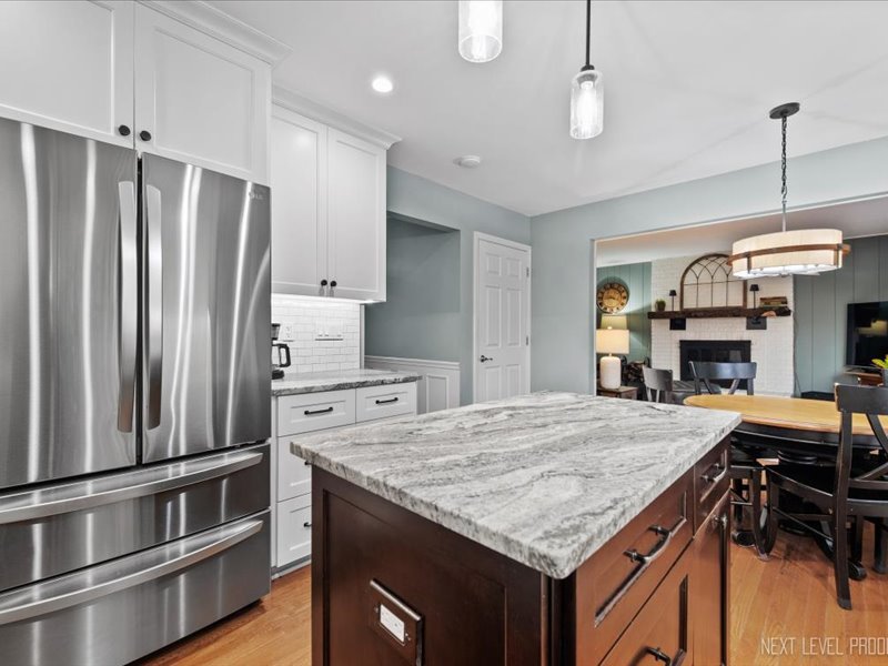 2040 Forest Ridge Road St. Charles, IL 60174 - Photo 10 of 33 a kitchen with kitchen island a counter space a sink appliances and cabinets