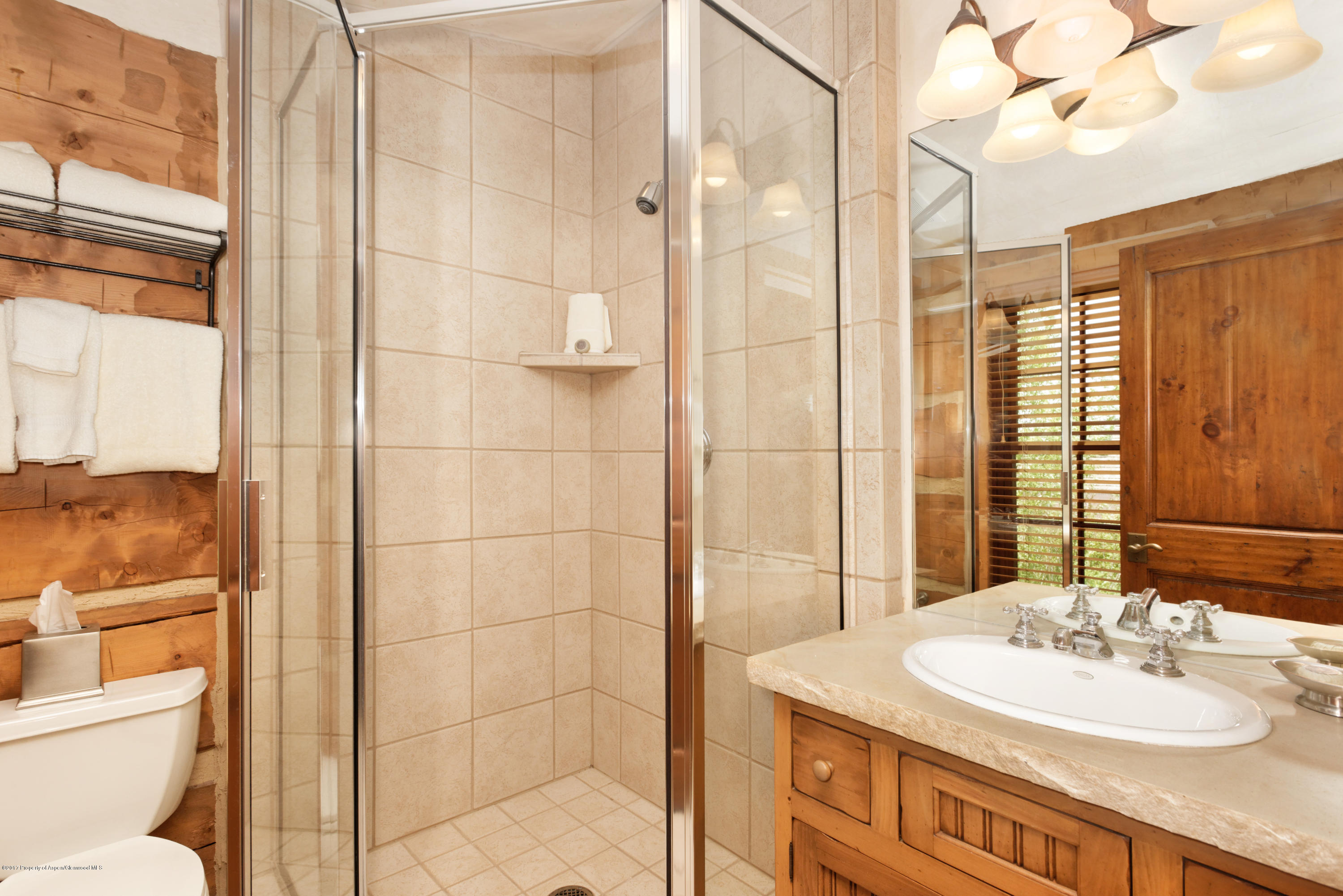 12 Arbaney Ranch Road, Unit 1/6 INTEREST Basalt, CO 81621 - Photo 13 of 22 a bathroom with a sink toilet and shower