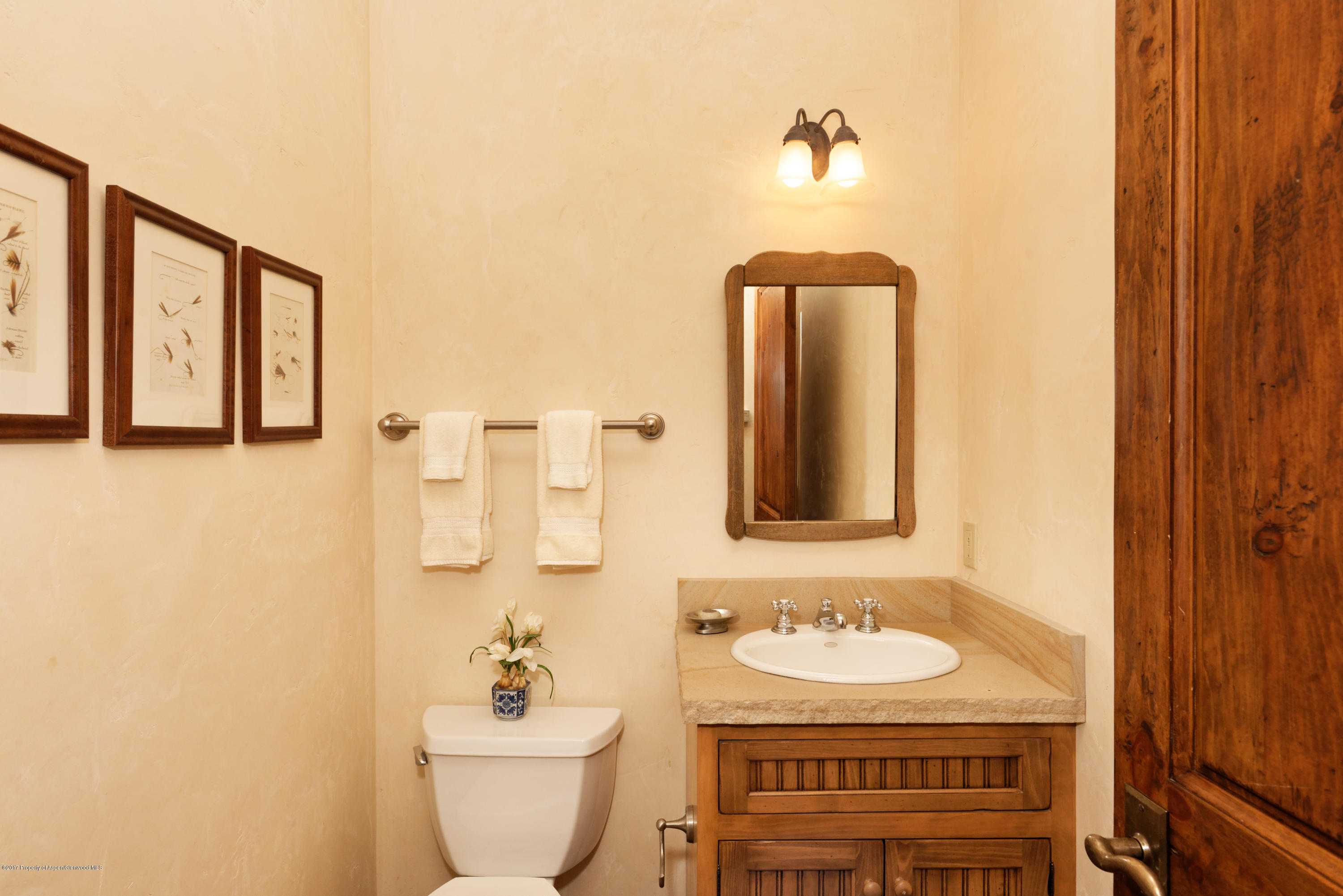 12 Arbaney Ranch Road, Unit 1/6 INTEREST Basalt, CO 81621 - Photo 14 of 22 a bathroom with a sink and a mirror