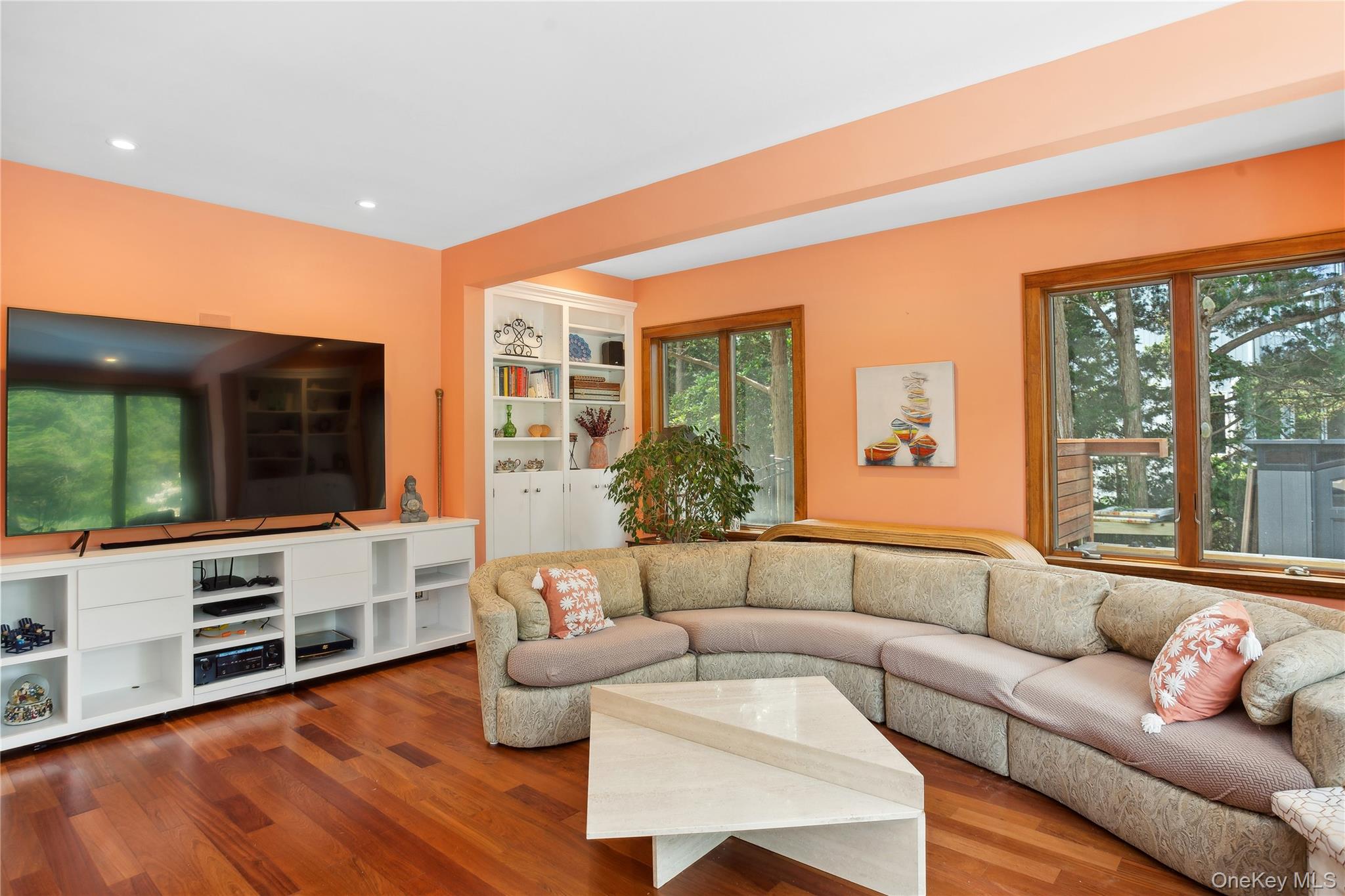 425 Cedar Point Drive East Southold, NY 11971 - Photo 23 of 47 a living room with furniture and a large window