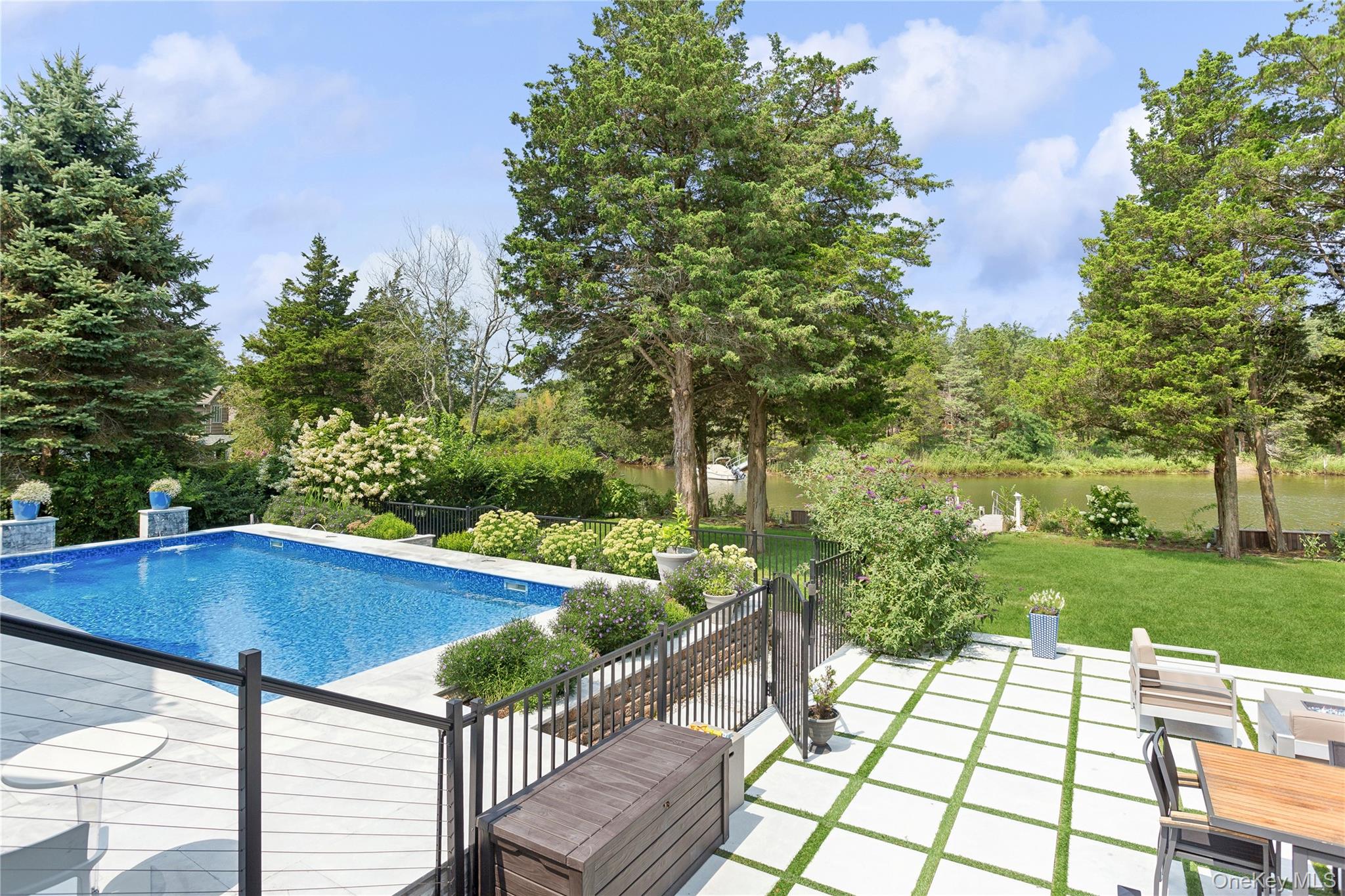 425 Cedar Point Drive East Southold, NY 11971 - Photo 32 of 47 a view of balcony with wooden floor and outdoor seating