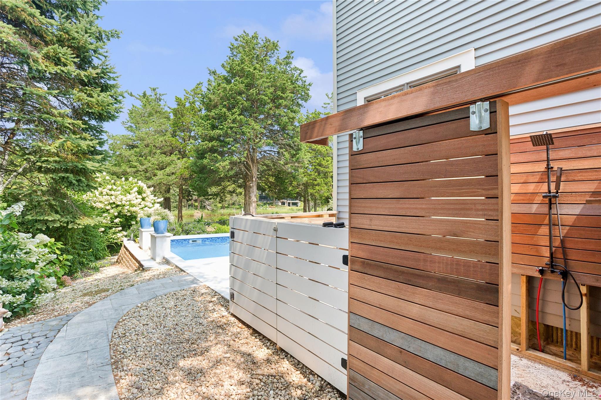 425 Cedar Point Drive East Southold, NY 11971 - Photo 40 of 47 a view of a house with a backyard