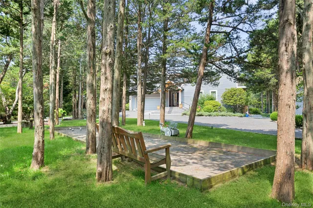 a view of a yard with an ocean view