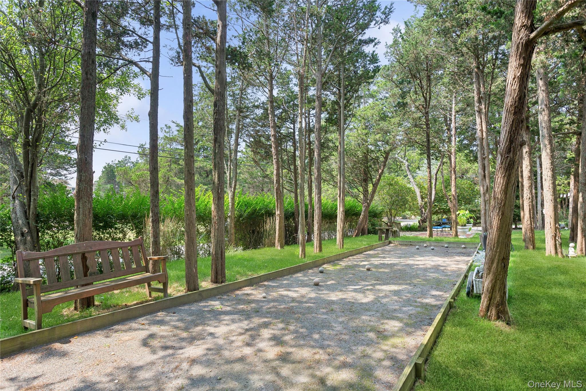 425 Cedar Point Drive East Southold, NY 11971 - Photo 43 of 47 a view of a park with large trees