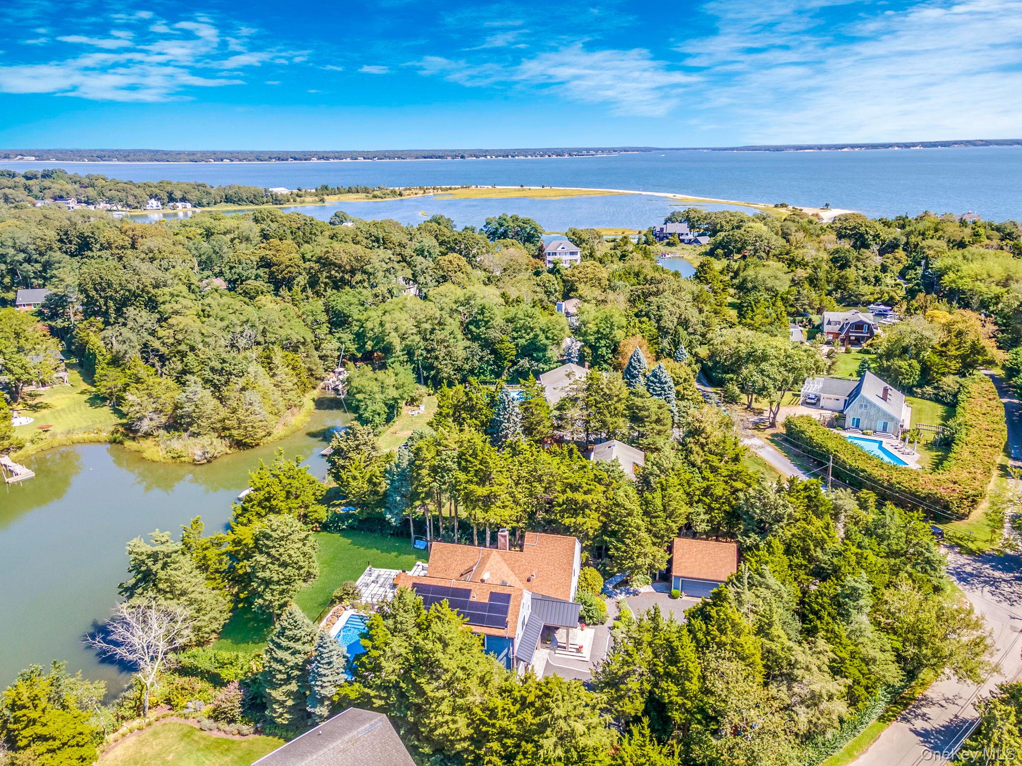 425 Cedar Point Drive East Southold, NY 11971 - Photo 44 of 47 a view of a yard with an ocean view