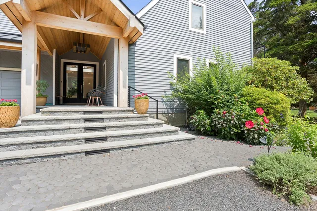a view of a livingroom with furniture and window