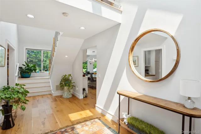 a living room with fireplace furniture and a flat screen tv