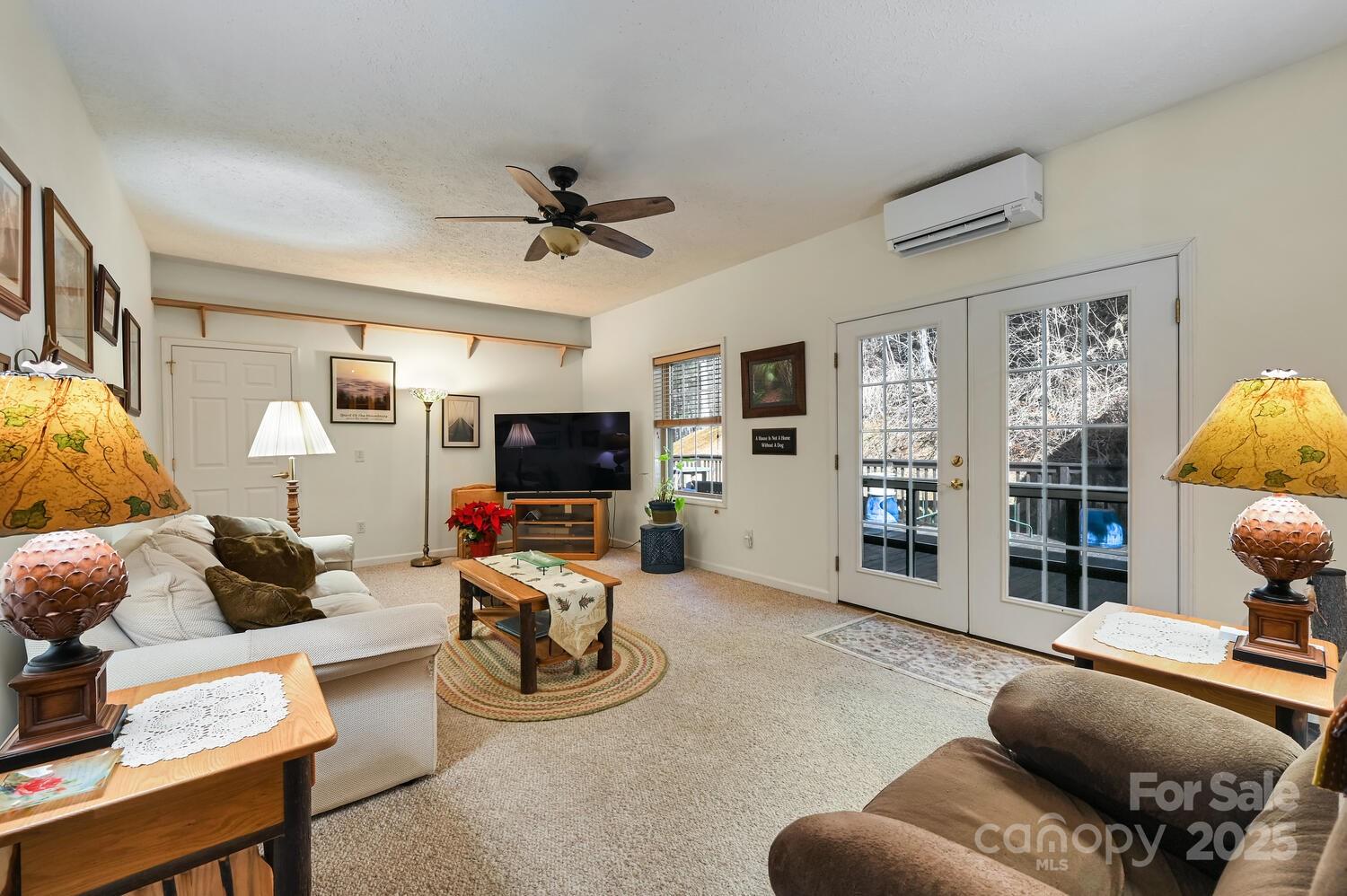 2 Ruffed Grouse Drive Weaverville, NC 28787 - Photo 12 of 44 a living room with furniture and a flat screen tv