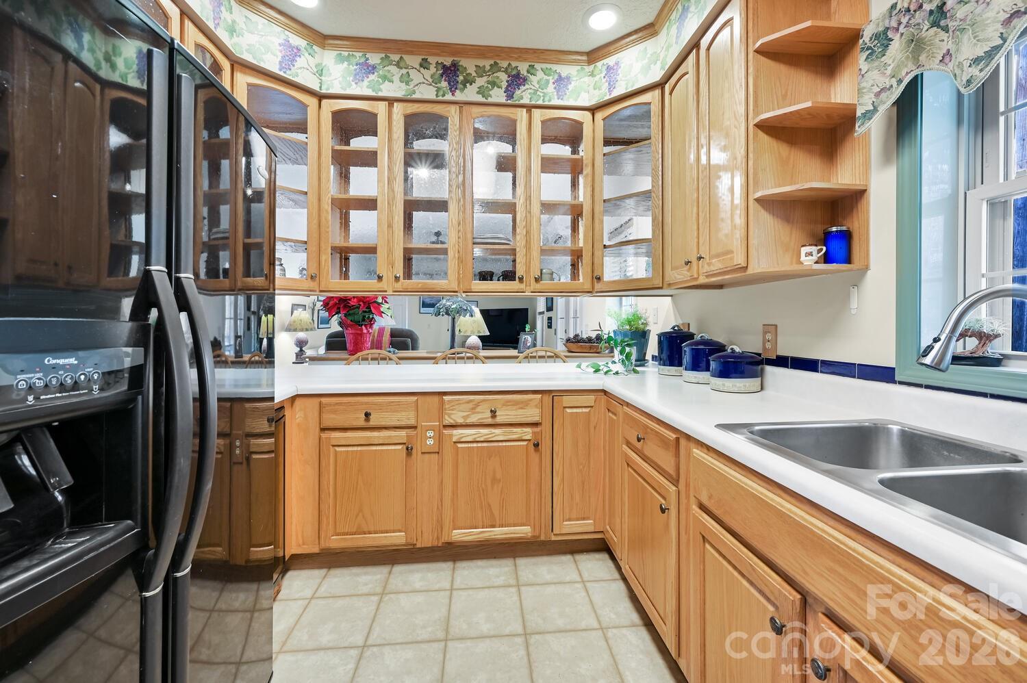 2 Ruffed Grouse Drive Weaverville, NC 28787 - Photo 16 of 44 a kitchen with stainless steel appliances a sink stove and cabinets